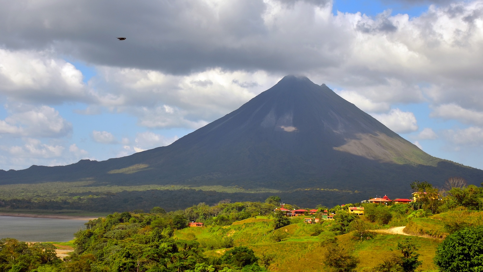 arenal-volcano Arenal Volcano and Lake Arenal shot from the Arenal Butterfly Conservatory