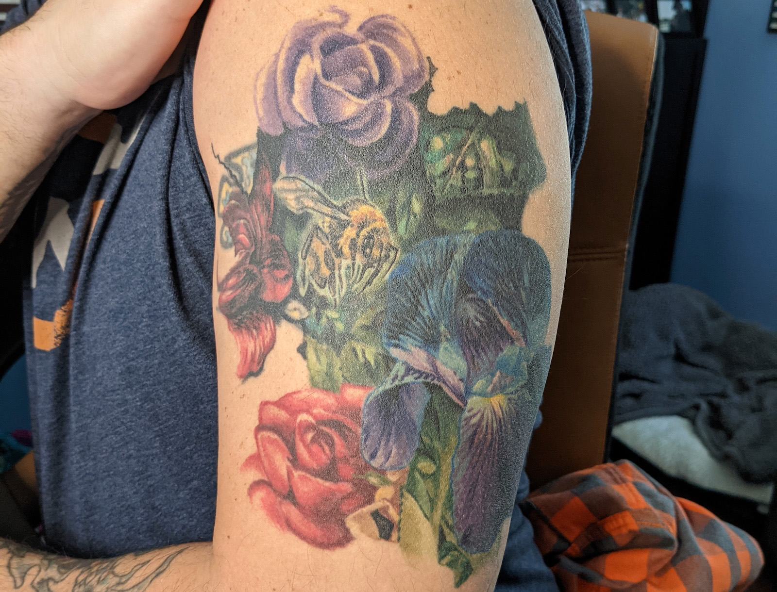 My unfinished left bicep cover-up tattoo that looks like a puzzle piece.